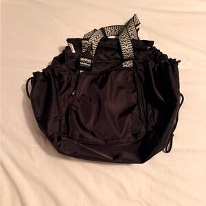 Elegant Black Baby Bag with Patterned Straps